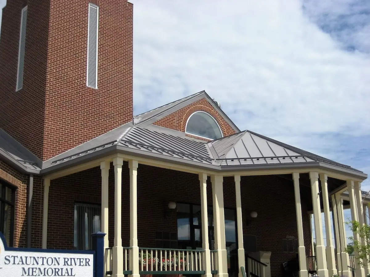 Skilled roofing craftsmen working on a residential roof in Wilmore